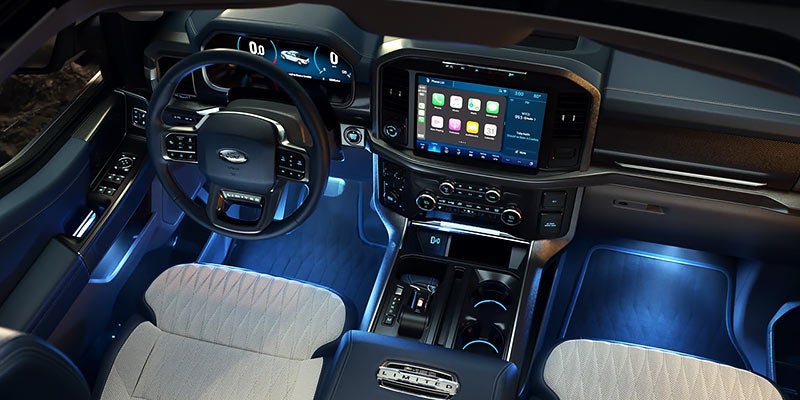 Interior panel of a 2021 Ford F-150 showing Ford Sync 4 technology